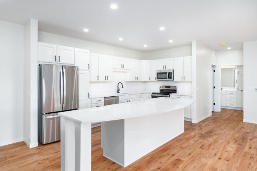 Step into this thoughtfully designed residence that seamlessly blends modern luxury with functional elegance.