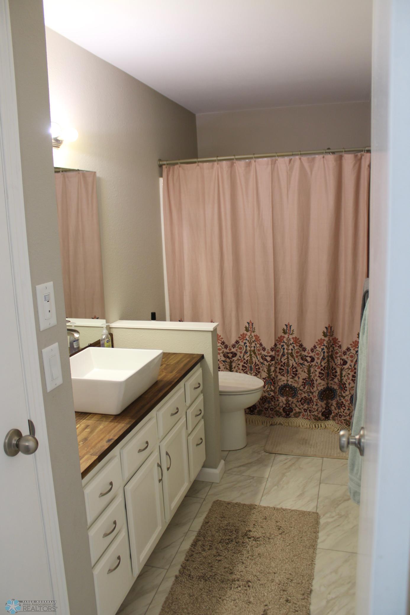 Upper level full bathroom with lots of updates