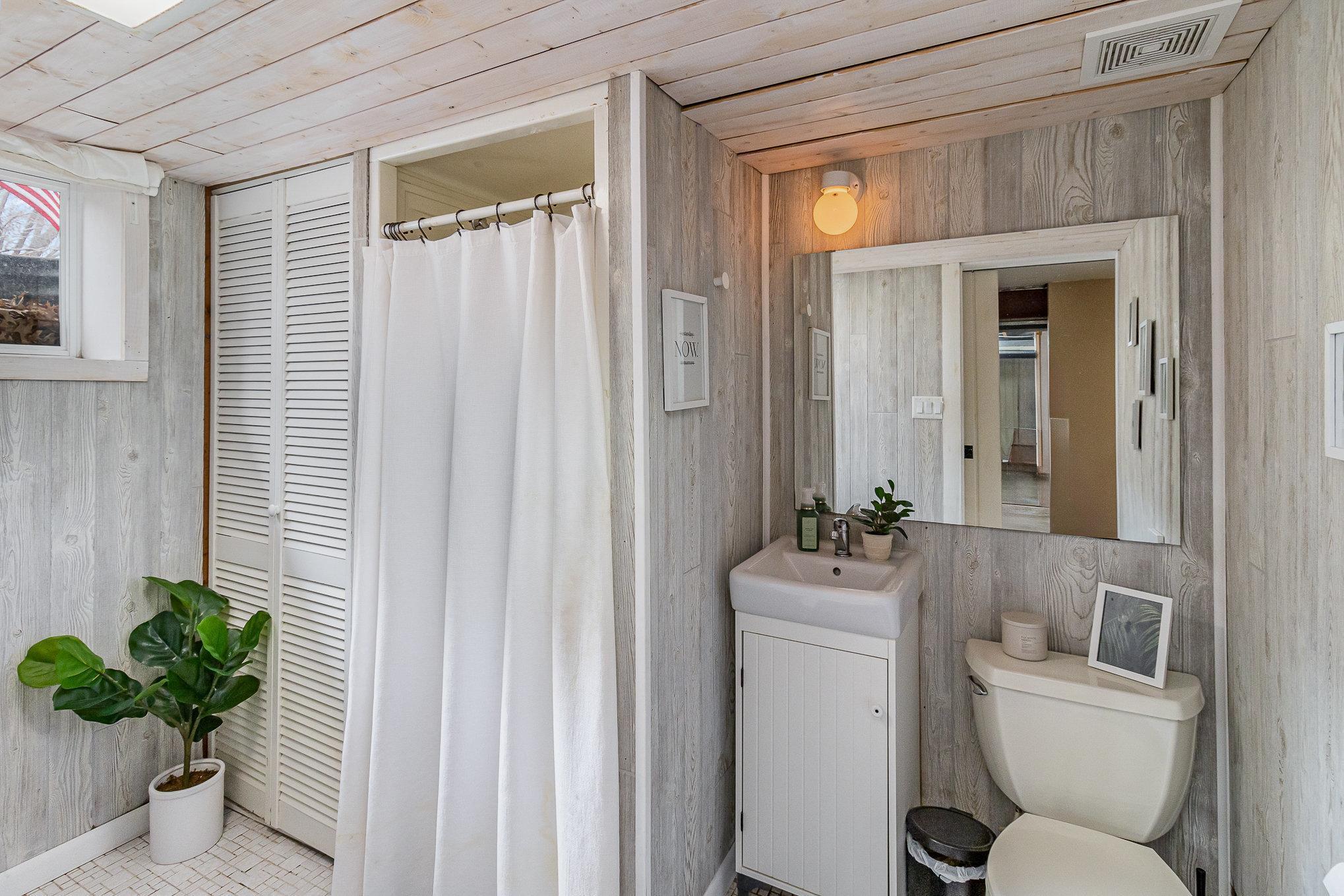 Lower level 3/4 bathroom is handy dandy for those who might want to live independently from the upper level. Perhaps multi generation living would be an option or for any teen ager who wants their "space".