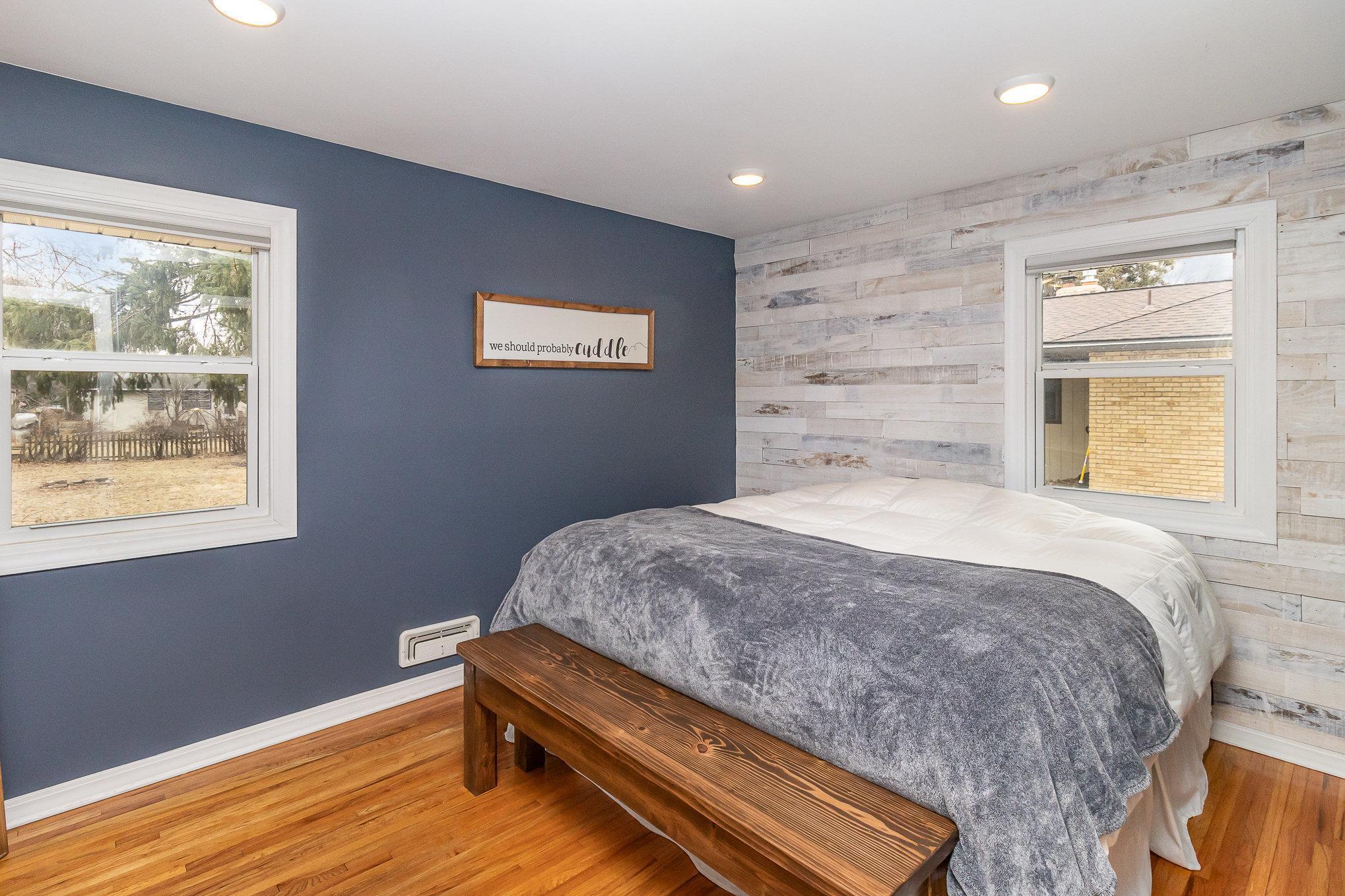 Primary bedroom is located at the back of the home with views of the back yard.