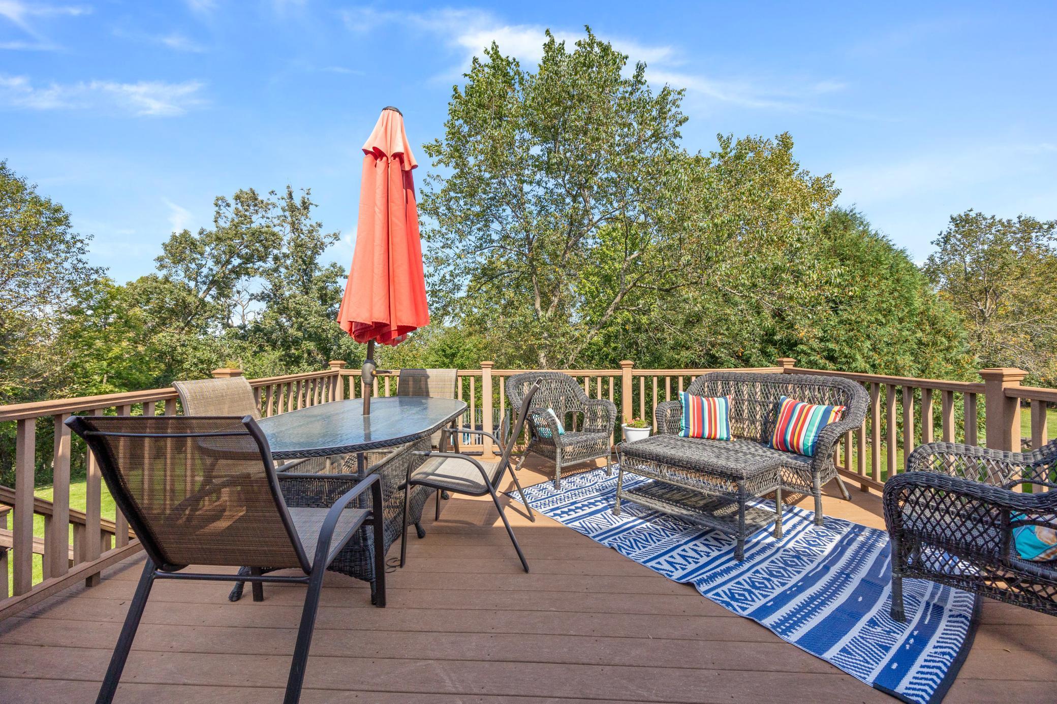 House Deck off the Kitchen with a Staircase to access the back lawn.jpg