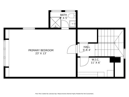 3rd floor primary bedroom suite with a vaulted ceiling, built-in window seat and bookshelves, a 3/4 bath, and walk-in closet. An inviting retreat as a bedroom or as additional living space.