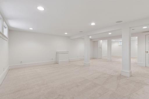Functional and inviting space with recessed lighting, replaced daylight windows, new carpet and fresh paint.