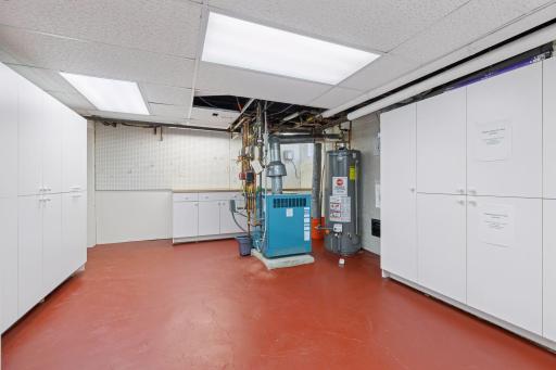 Workshop area and storage in utility room. Radon mitigation installed. 2018 water heater. Boiler/radiator heat. Central air conditioning and supplemental mini split on main and lower level. Whole house generator. Irrigation.