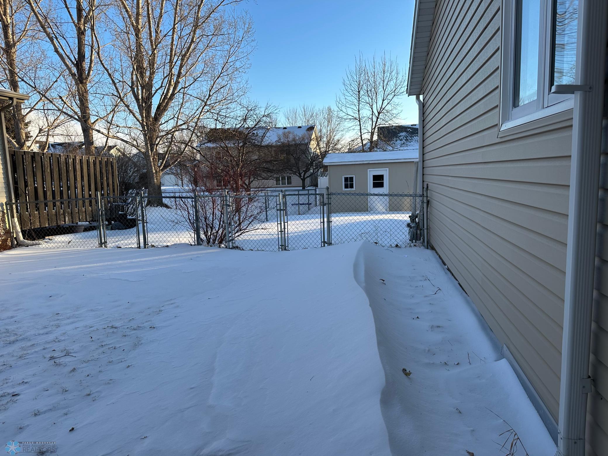 Side of home off back garage door