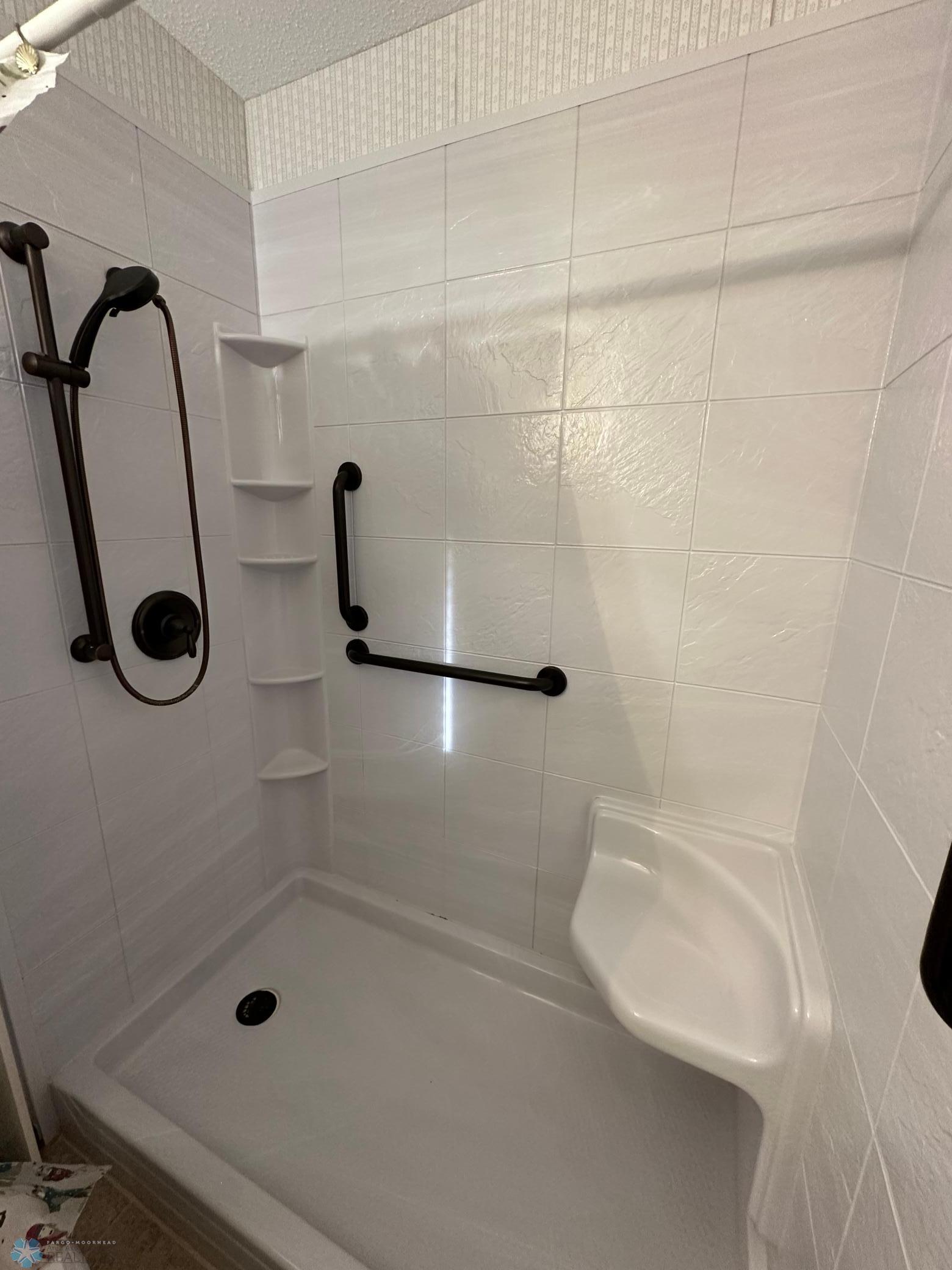 Newer surround shower from bathroom fitter