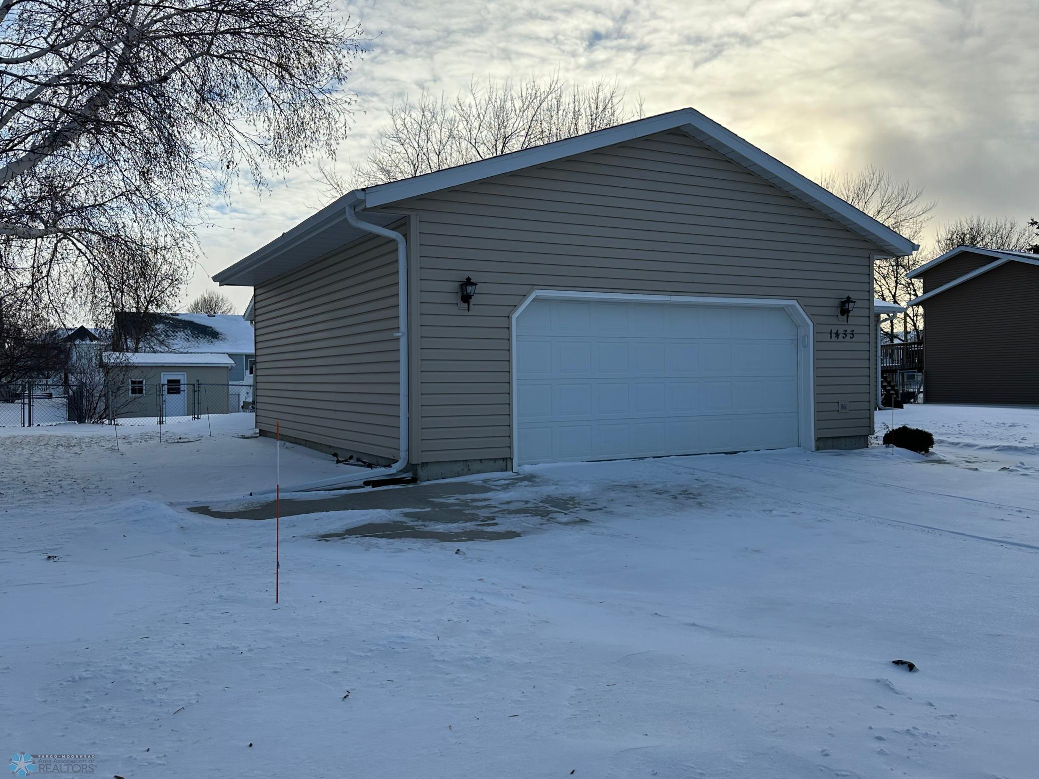 Extra parking slab on side of garage
