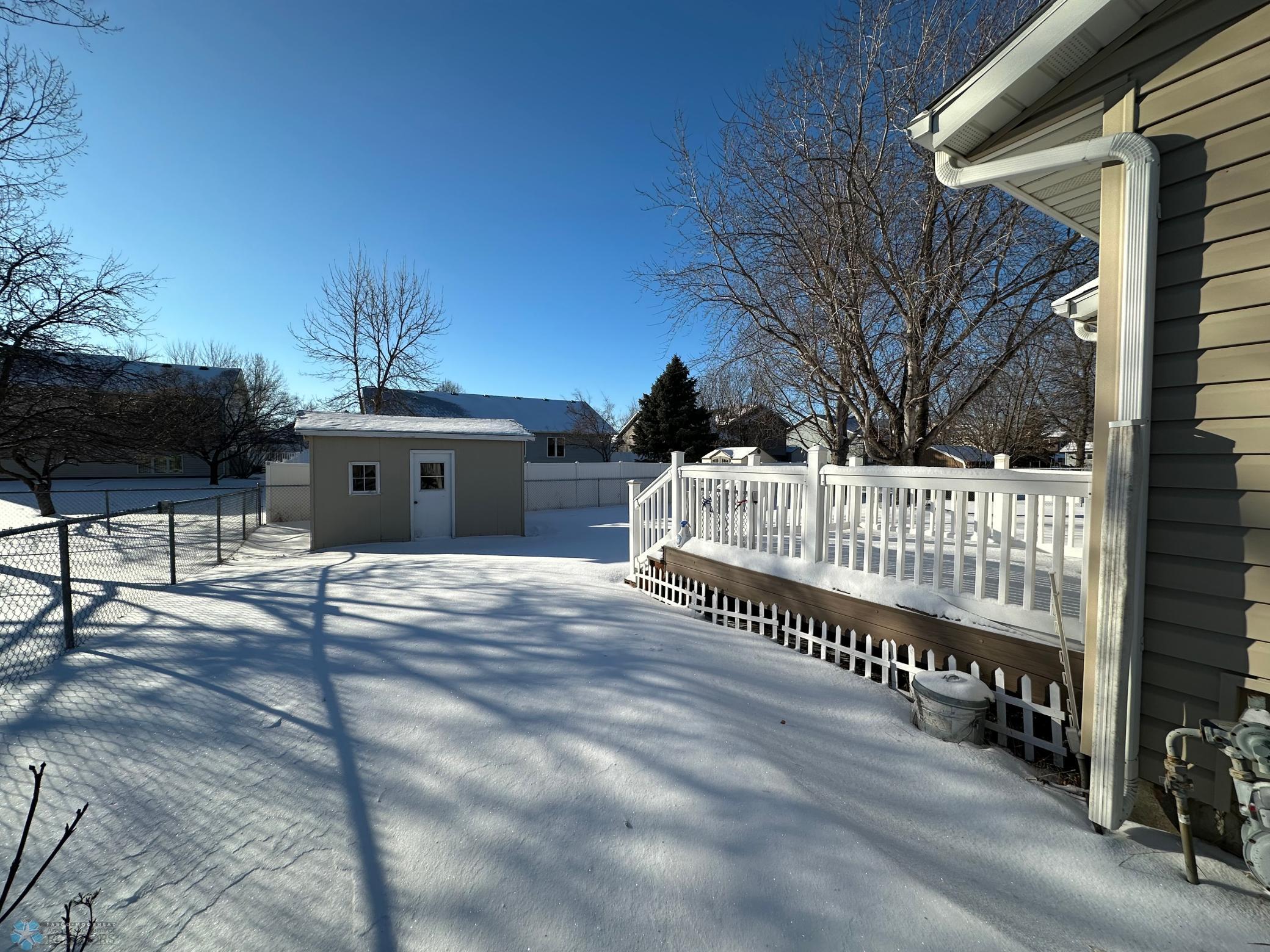 Storage shed and fully fenced yard