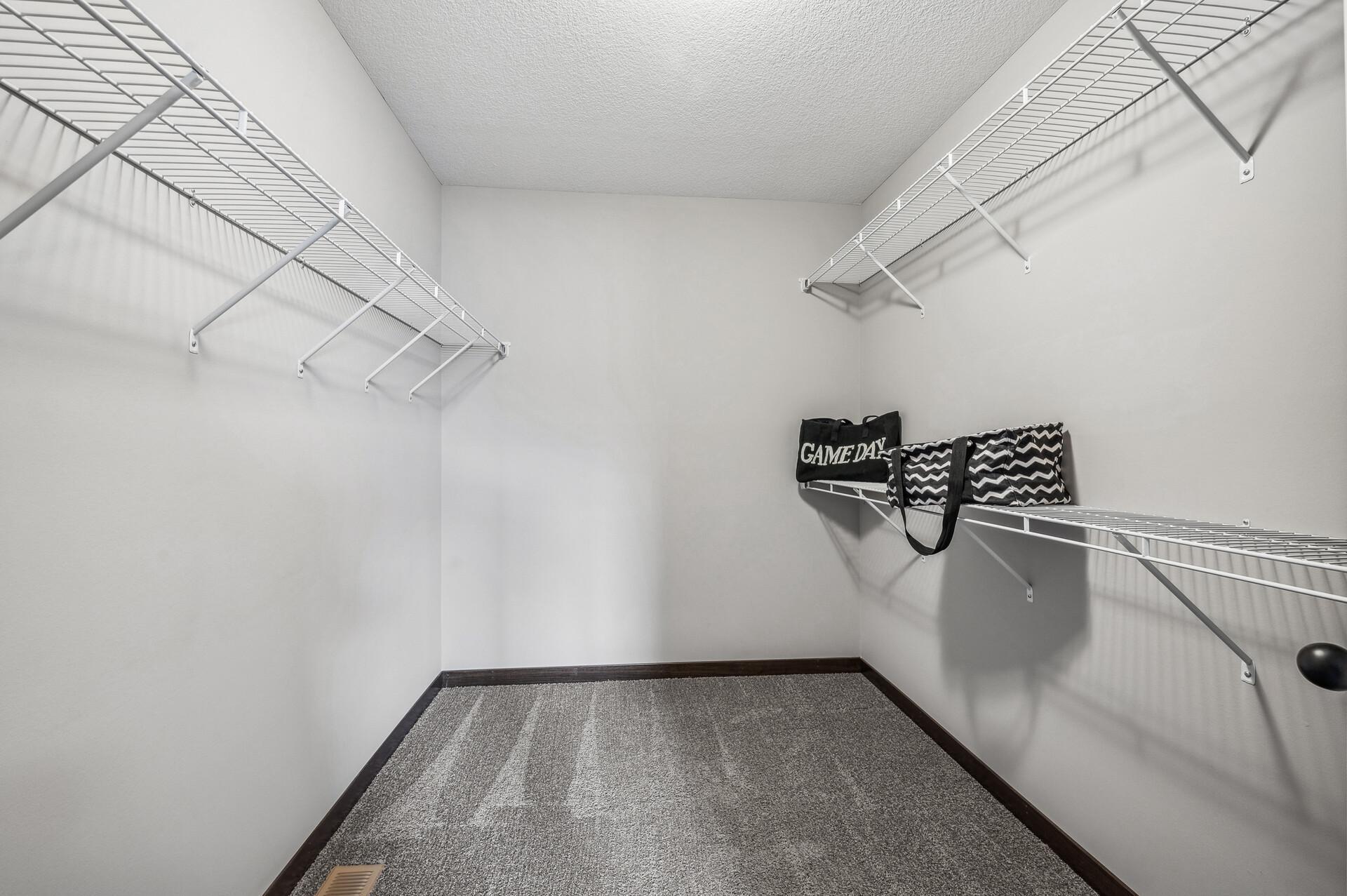 Large walk in primary bedroom closet