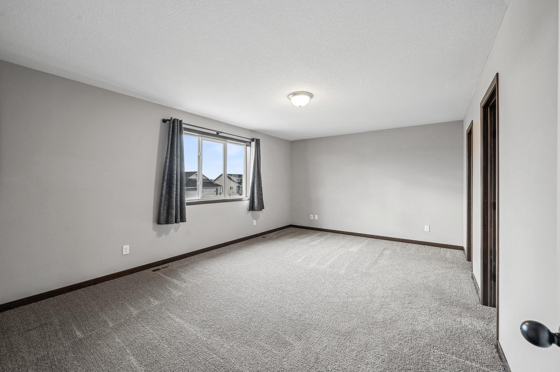 Spacious primary bedroom