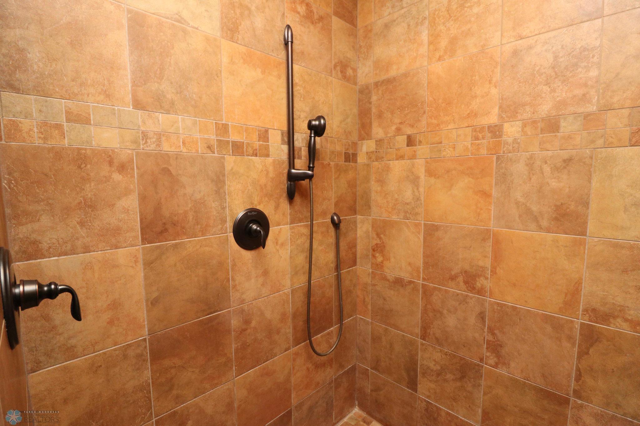 primary bath-tiled shower