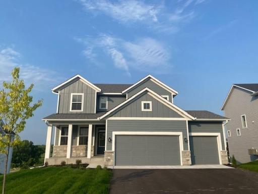 Lovely New 5 bedroom home! Charing front porch for your rocking chairs or Adirondack chairs! Huge 3-car garage! New Home Warranties! Finished Basement w/ bedroom and bathroom, and sun-filled basement with Walkout!