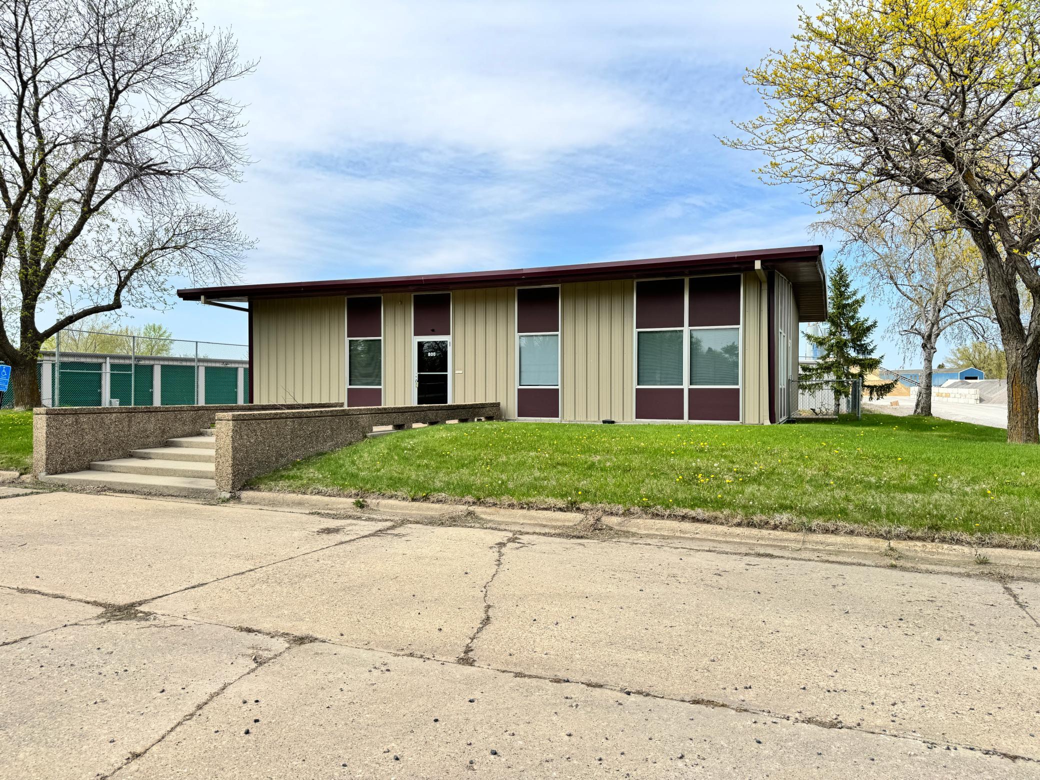 Exterior from eastern perspective - note the windows in each room.