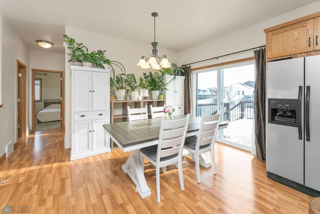 Dining space + patio door to deck/ back yard