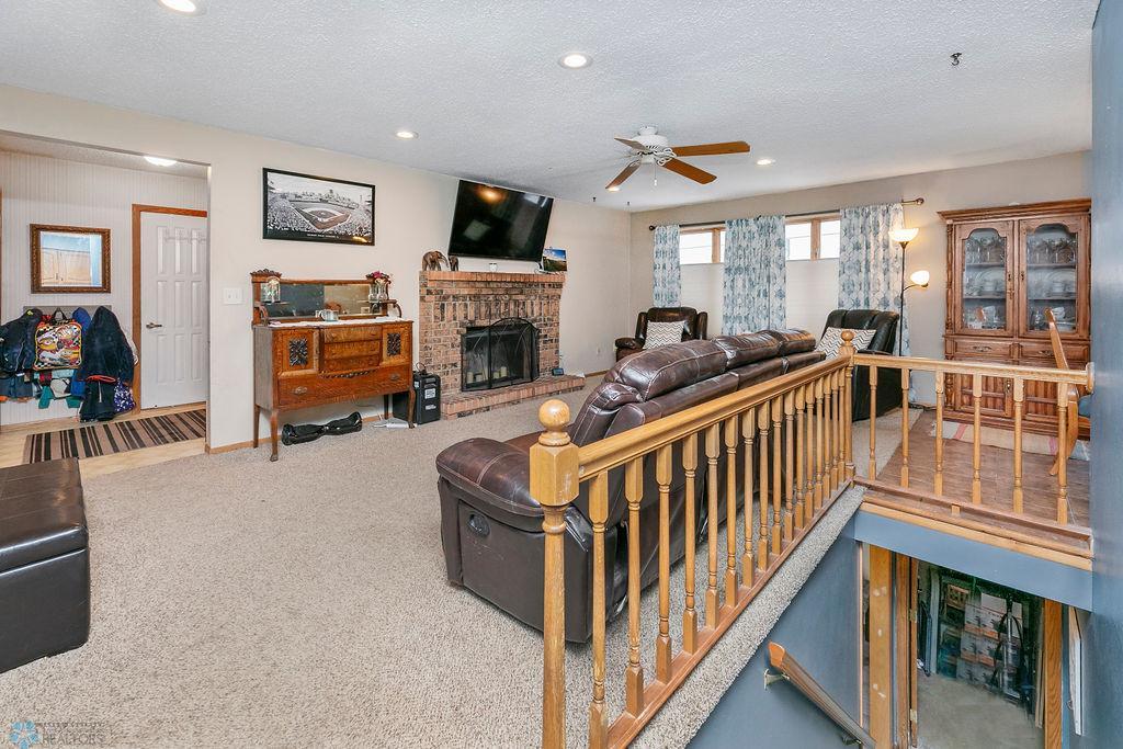Living Room with brick w/b fireplace
