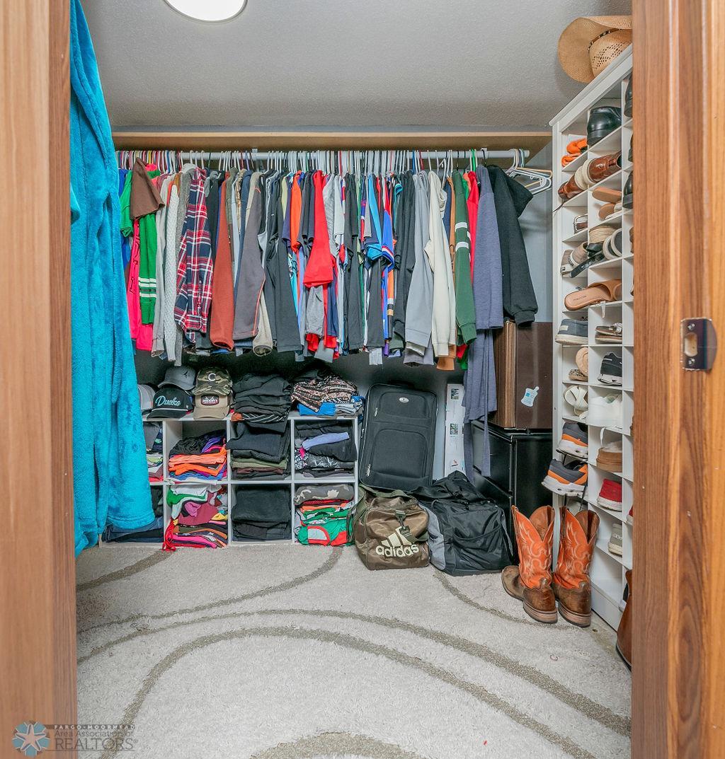 Huge walk-in closet off basement non-egress bedroom