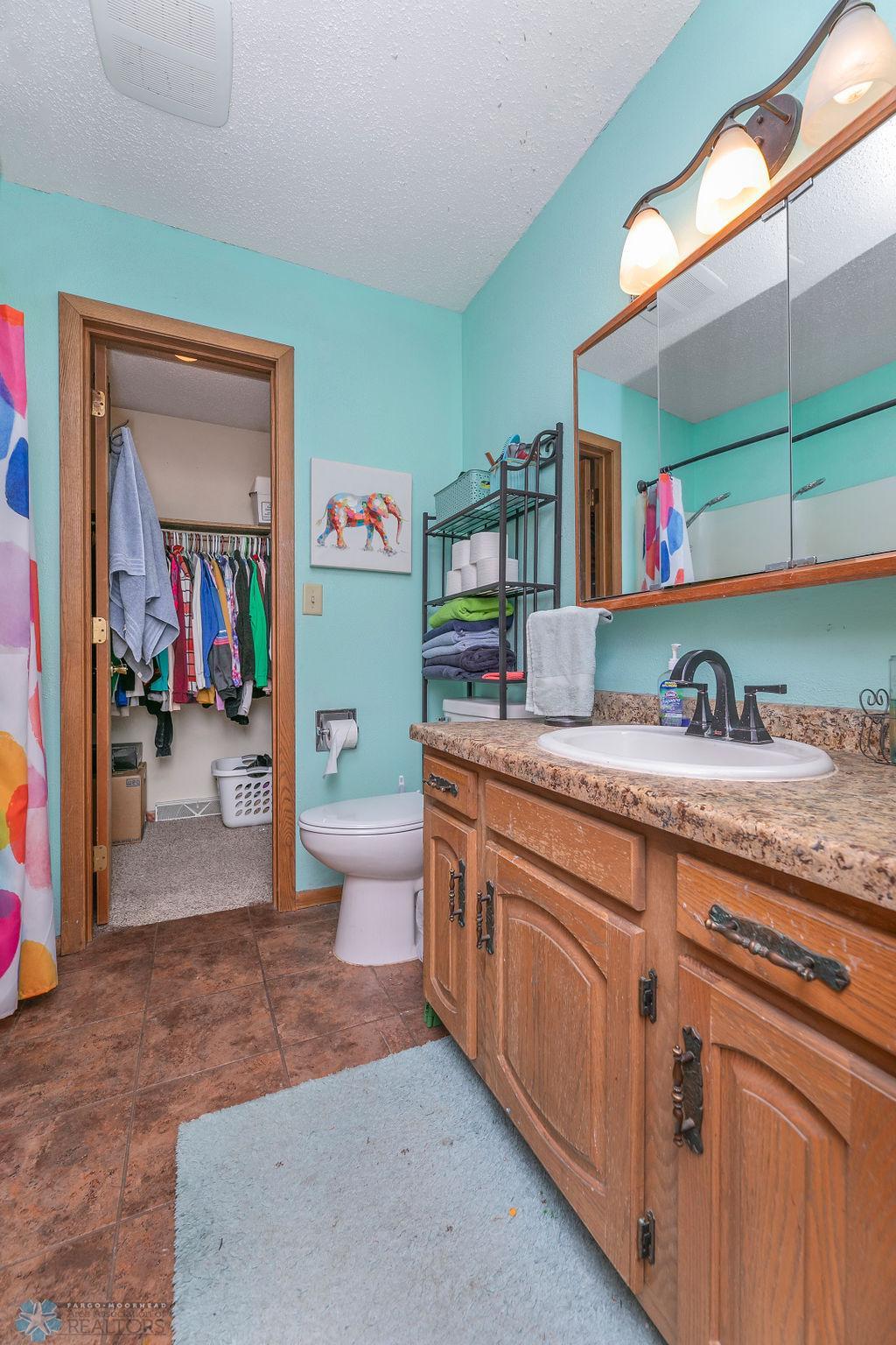 Connects to main floor Hollywood Bath