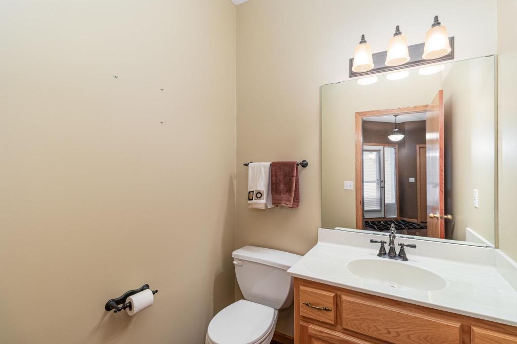 652 Aqua Cir small.jpg Main floor half bath.jpg