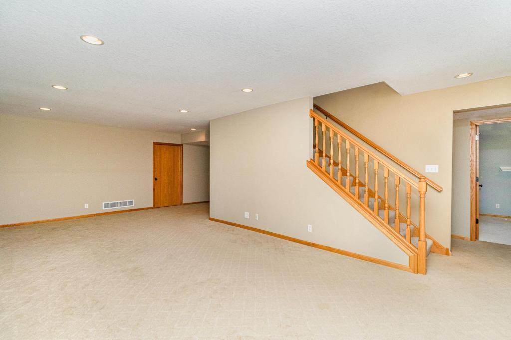 652 Aqua Cir small.jpg Lower level family room.jpg