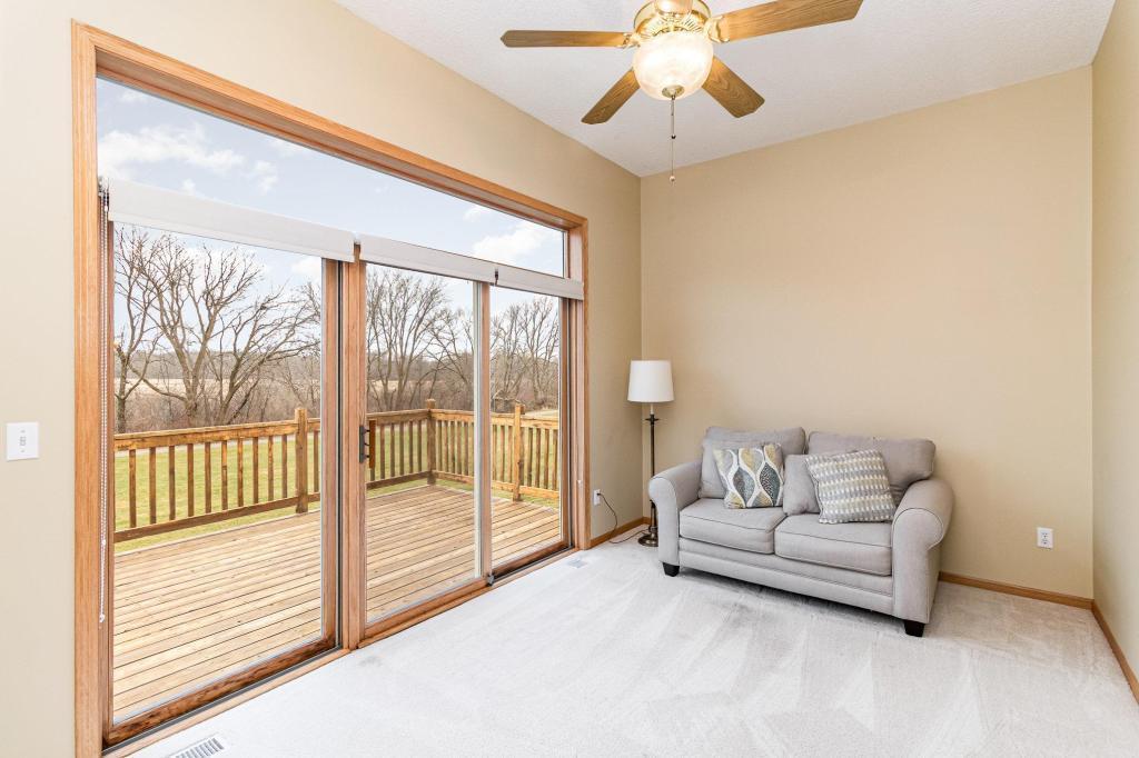 652 Aqua Cir small.jpg Four season porch overlooking the nature filled view.jpg