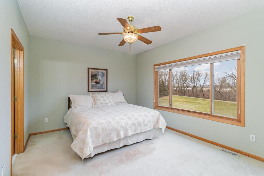 652 Aqua Cir small.jpg Primary bedroom with scenic view.jpg