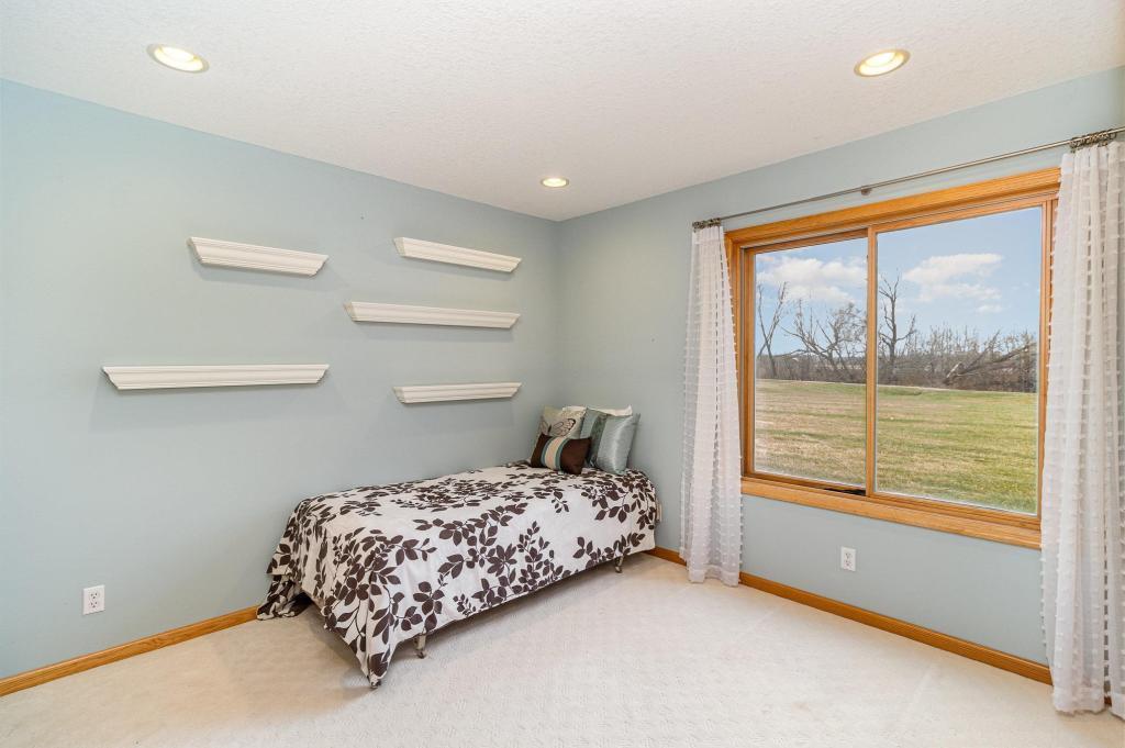 652 Aqua Cir small.jpg Lower level bedroom with great view.jpg