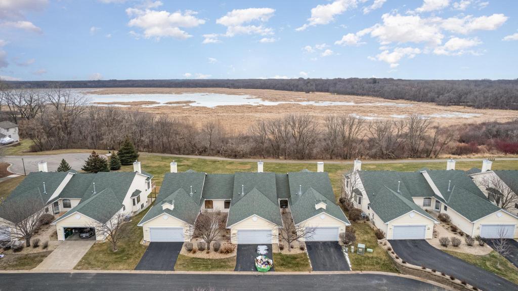 652 Aqua Cir small.jpg Middle home in the set of three.jpg