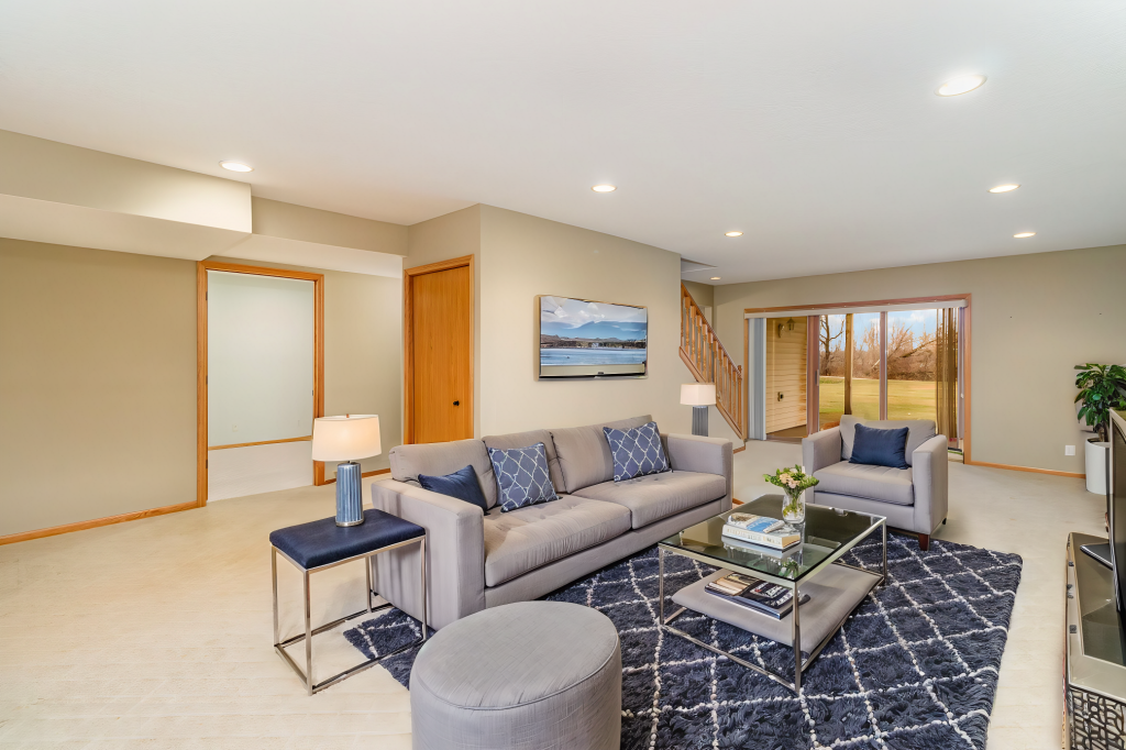 652 Aqua Cir small.jpg FAmily room virtually staged.jpg