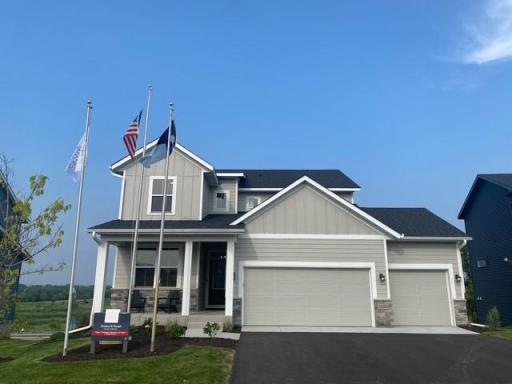 This Model home is now for sale! Move right in! large 3-car garage. Walkout basement. And Finished basement, too. This 5 bedroom home (includes main floor bedroom/or use as flex rm). Plus 2nd floor loft. Charming front porch & just steps to the pool!