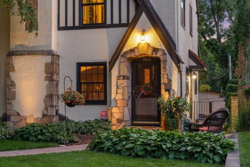 Beautiful professionally landscaped yard. Stone paved front patio.