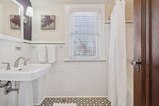 Charming original tiled full bathroom. Lovely.
