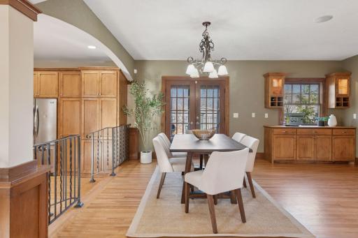 The Dining Room - Built-in Buffet matching the warm kitchen cabinets.