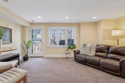 Walk-out Lower Level Family Room - Recessed lighting, fresh paint and carpeted flooring. Light and Bright!