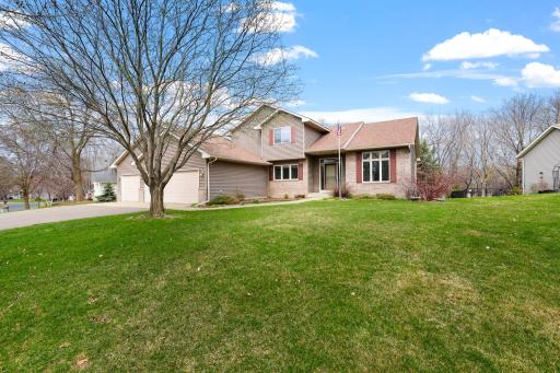 Meticulously care for 4 bedroom home is perfectly situated on a partially private lot and is steps away from historic downtown Prior Lake