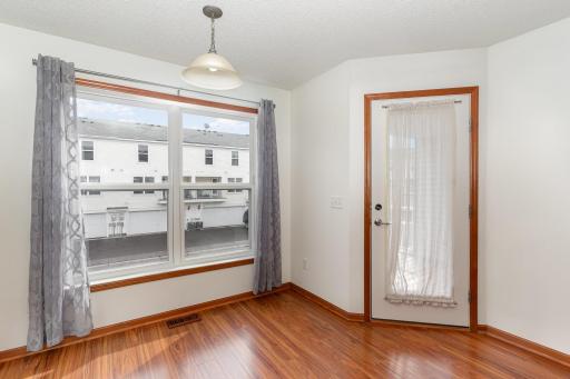 Eat in kitchen space w door to deck/balcony