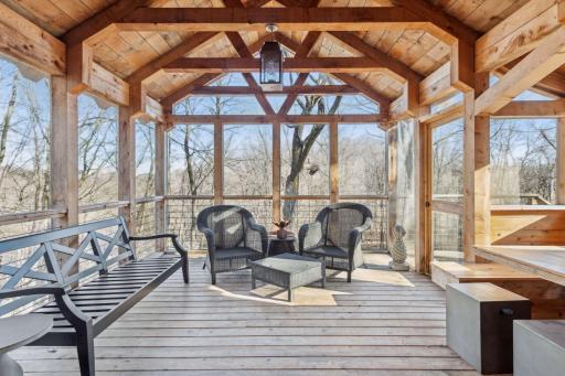 Fantastic screen porch with built in table and seating.