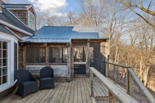 Deck has access to the screened porch and stairs to the back yard.