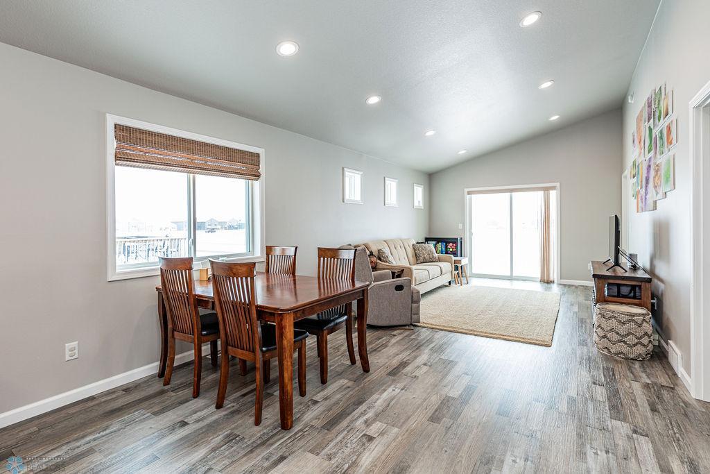 Open concept kitchen-dining-living
