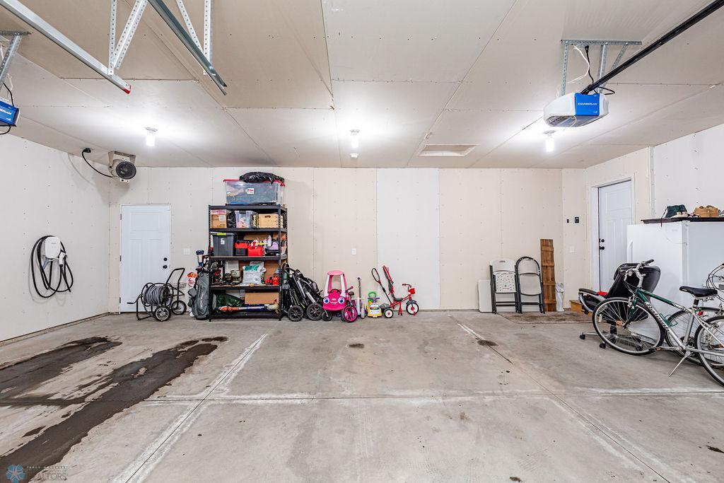 Attached garage is heated & finished w/ access to attic storage