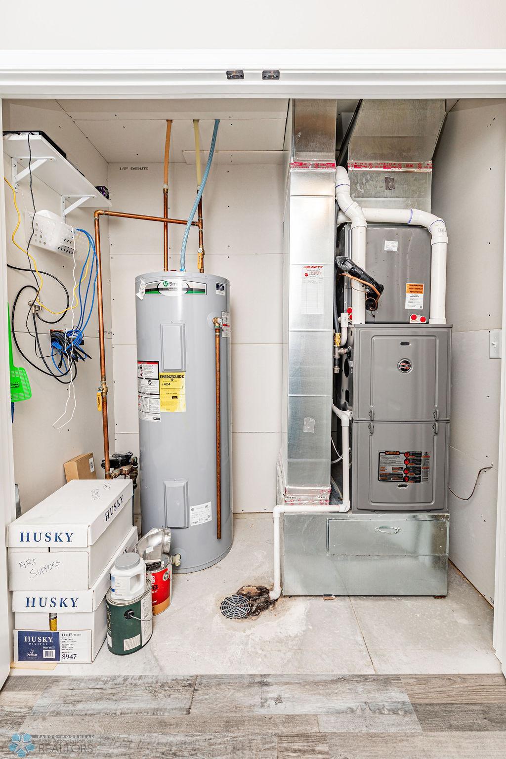 Mechanical systems nicely tucked away in their own closet off Laundry