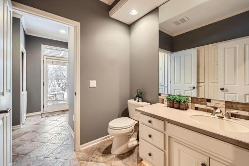 Pool entrance to steam shower and bathroom