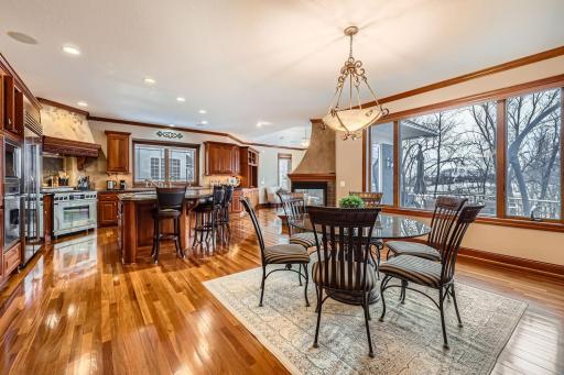 Informal dining room, kitchen and hearth room view