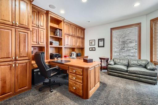 2nd main floor with cherry wood work in built-in desk, cabinets and bookshelves