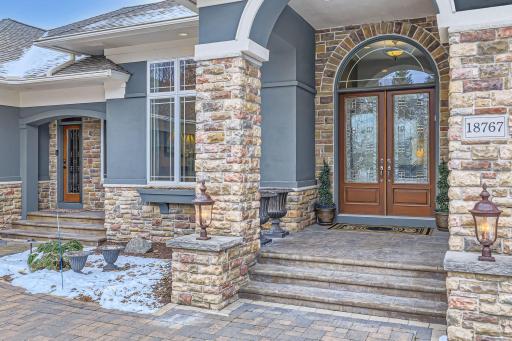 Close view of home. Beautiful double door entry.