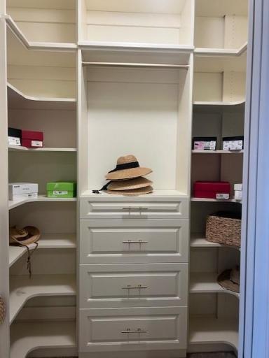 2nd primary closet with all the upgraded built-ins