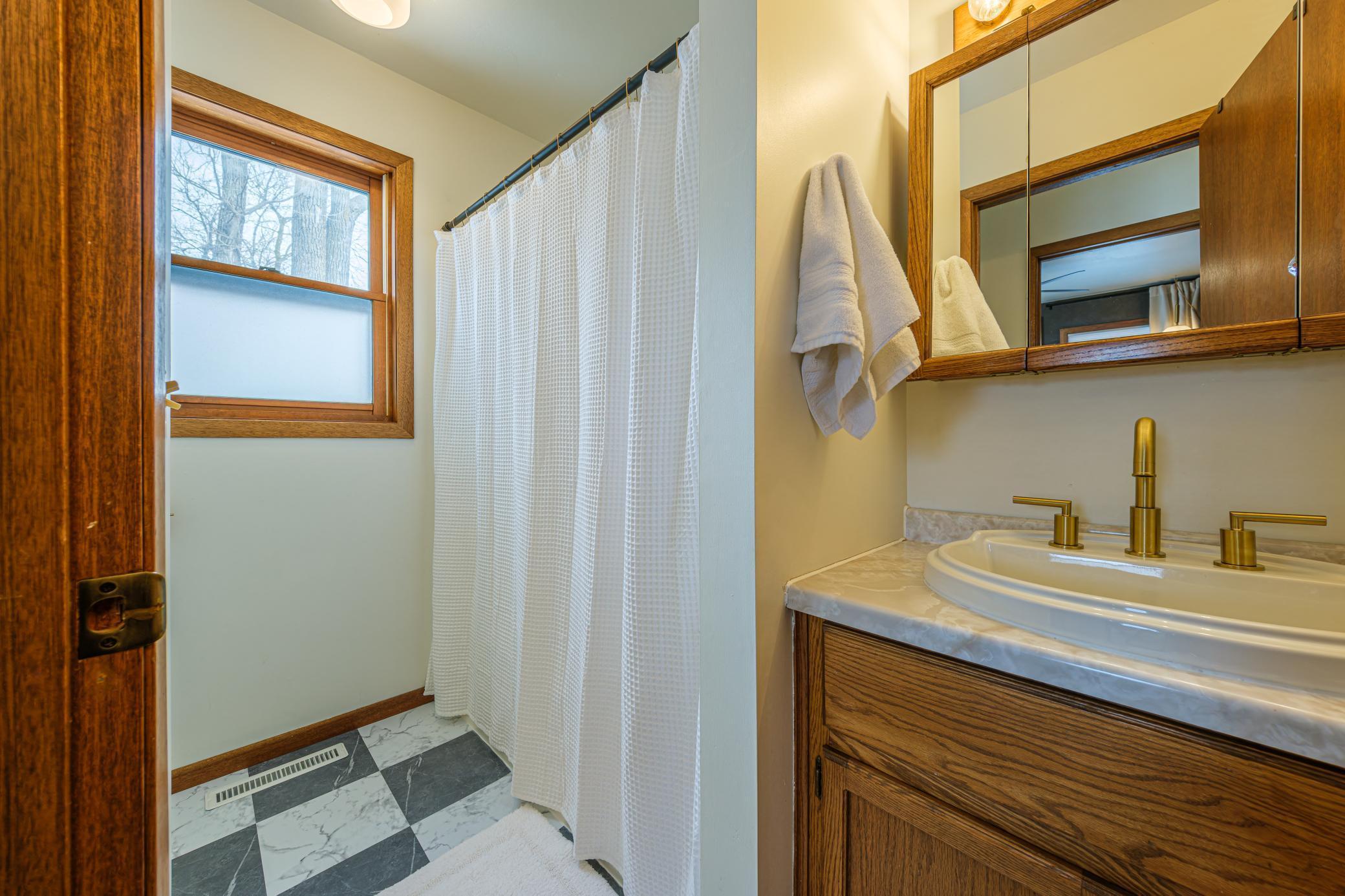 Second floor features a full bathroom.