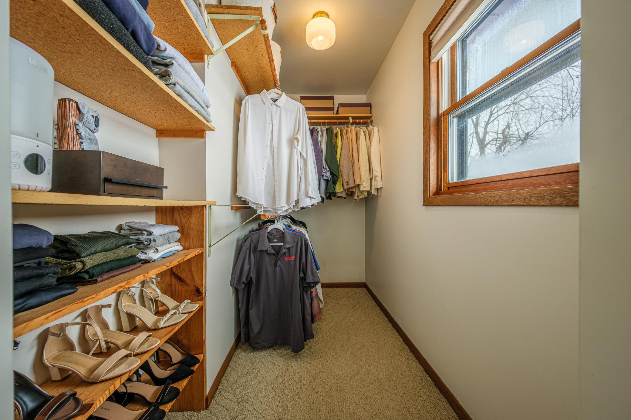 Primary bedroom features a walk-in closet.