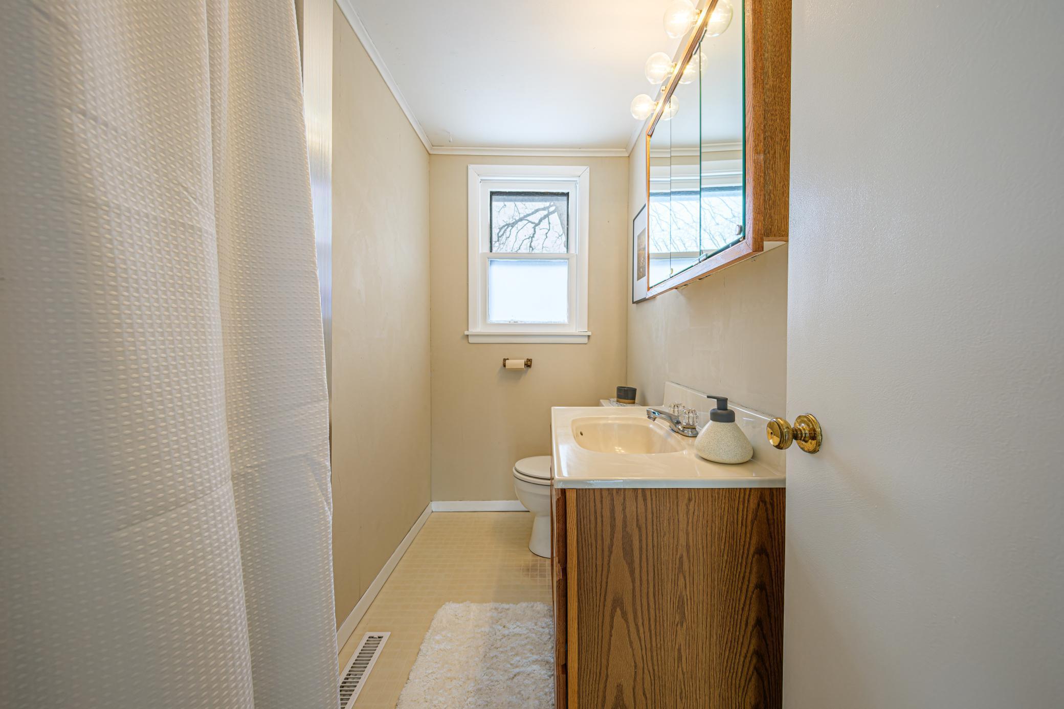 Main floor features a 3/4 bathroom.