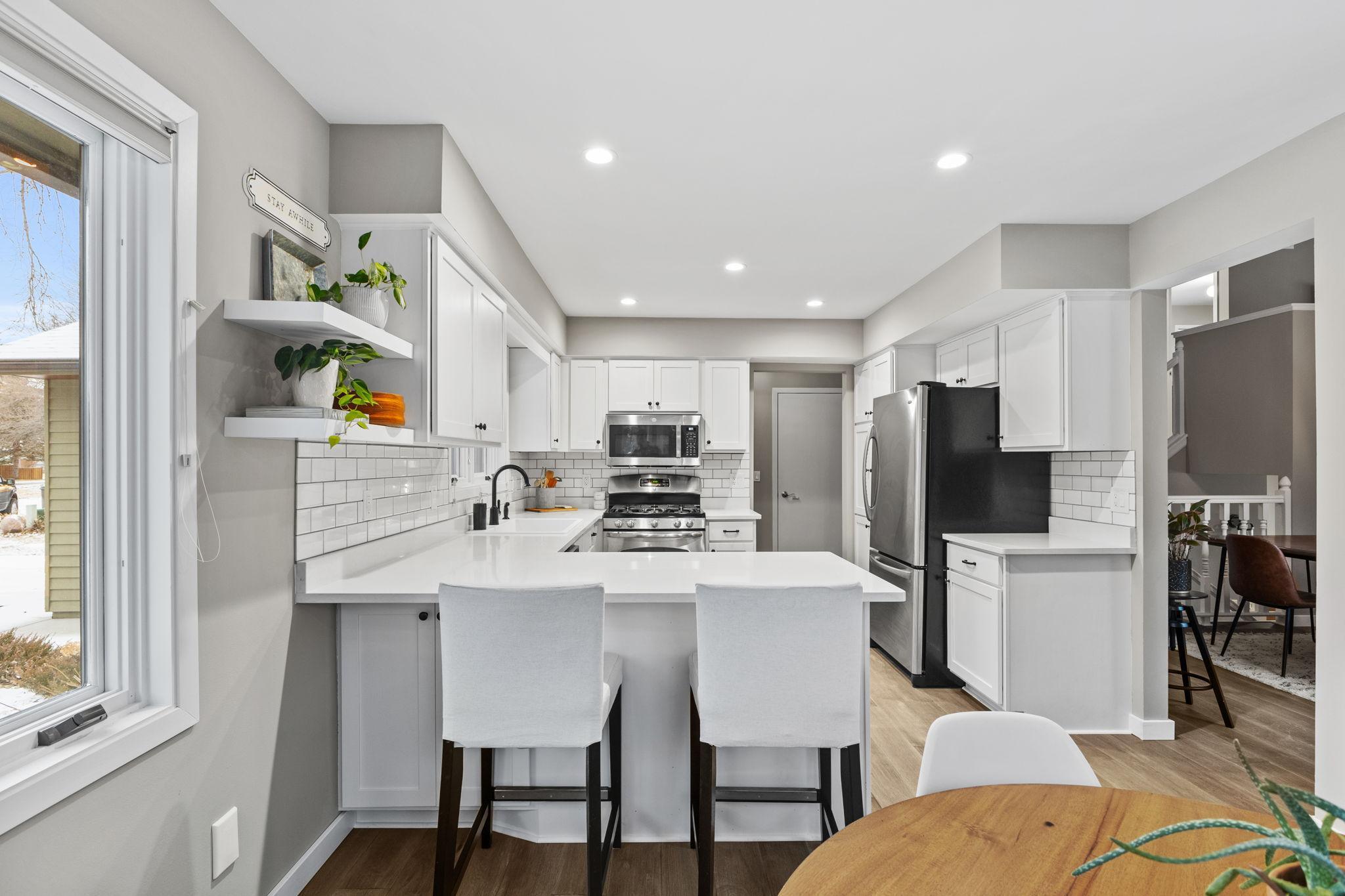 With its open-concept layout, this kitchen seamlessly flows into the dining and living areas, making it the heart of the home.