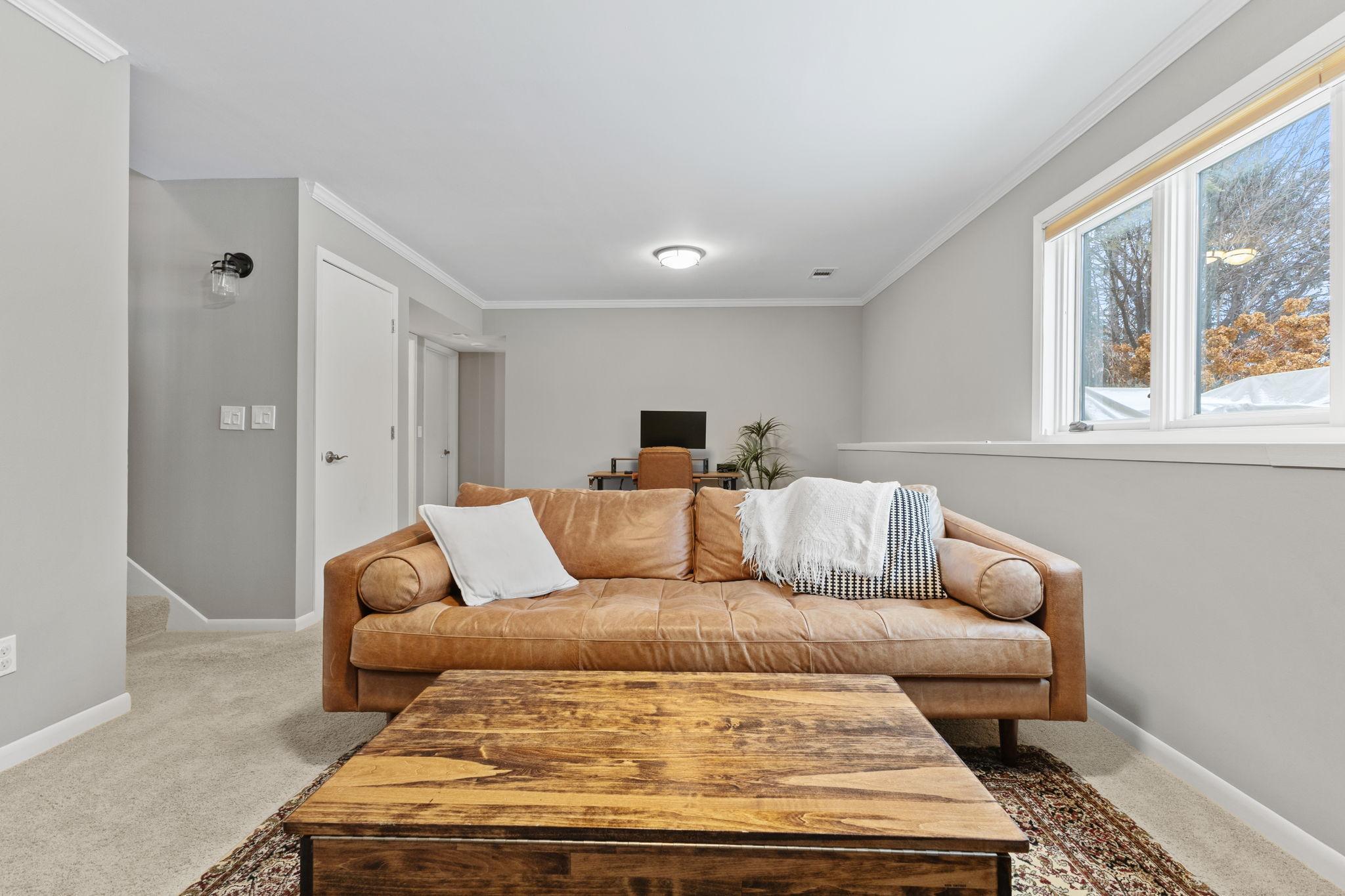 This spacious family room offers incredible versatility, allowing you to create a home office, workout area, playroom, or any space that fits your lifestyle!